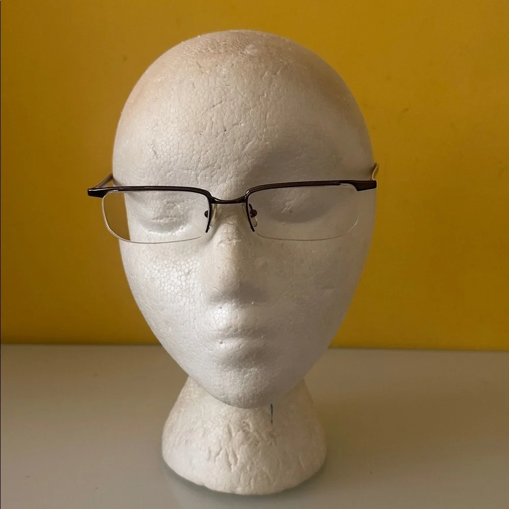 Prada Sleek Bronze Titanium Frameless Rectangular Prescription Glasses Frame